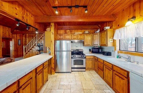 Tahoe Pines Cabin | Serene cabin with expansive deck, grill, fireplace - near skiing - walk to beach