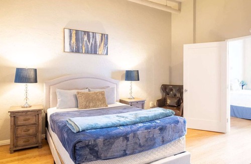 Gaslamp Quarter Hotel | Spacious 1 BR 700 sq ft loft suite with free parking, steps to the Convention Center and Gaslamp dining. Ideal for business or group travel.