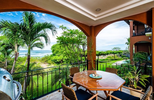 Playa Langosta Condo | Spacious beachfront 2-BR condo with Pool and a stunning sunset view