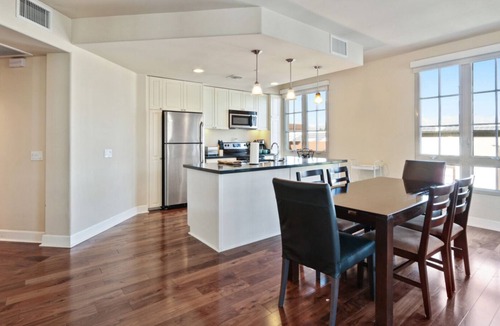 Downtown Apartment | Spacious Corner suite with hardwood floors & private balcony @Americana!