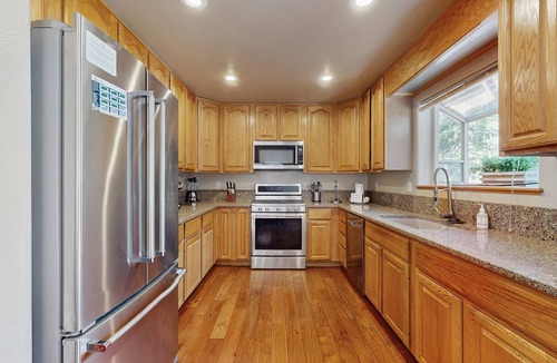 Pioneer Trail House | Spacious hideaway with private hot tub & huge yard - near the lake