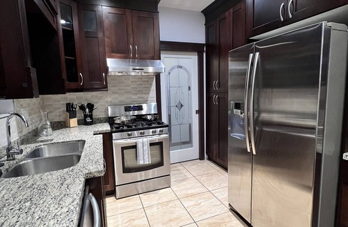 Vancouver South House | Spacious upper-level unit located on Main St.