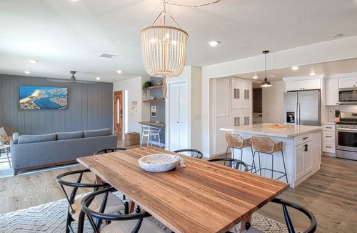 West Newport Condo | Spectacular ocean views await you from the large patio at this newly remodeled lower unit!