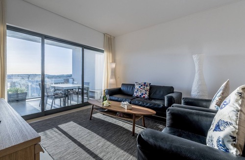Albardeira Apartment | Stunning apartment, marina, pool, garden & city view and terracce south facing