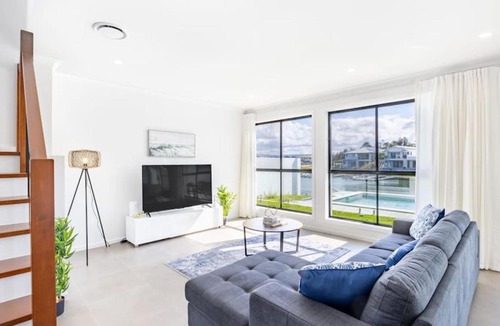 Helensvale House | Stunning waterfront family home with pontoon newly