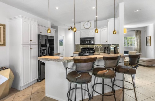 Racquet Club West House | Stylish, dog-friendly home with private pool, pool spa, enclosed yard & grill