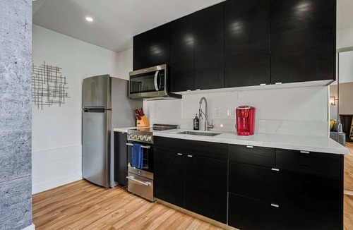 Little Italy Apartment | Stylish Little Italy Loft: Modern Urban Retreat