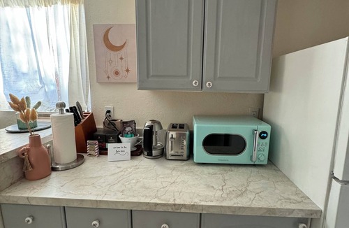 Live Oak Apartment | Sunny boho retreat with deck & stylish hot tub