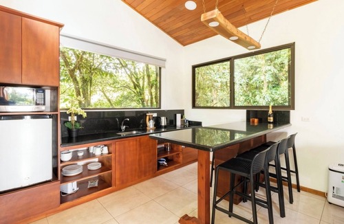 Quebrada Grande Apartment | Sunset Views Over the Cloud Forest Steps from Zip Lines, Farm & Wine