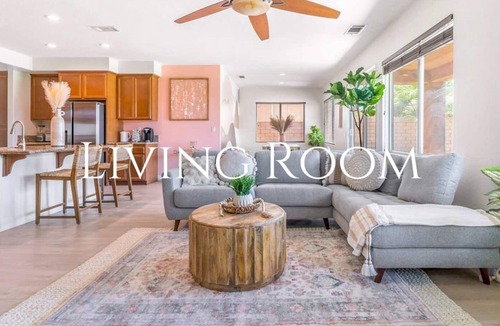 Terra Lago House | This spacious Indio home is designed for families, golf trips, festival weekends, and guests who want built-in entertainment. Enjoy a private saltwater pool, free spa, golf simulator, poolside cinema, game room, glamping yurt, hammocks, and karaoke.