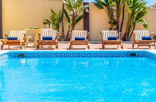 Montechoro Villa | Villa Crisandra - com piscina aquecível, em Albufeira