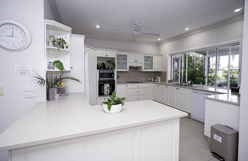 Broadbeach Waters House | Waterfront Family Home on lake - Private swimming pool, kayaks & paddleboards