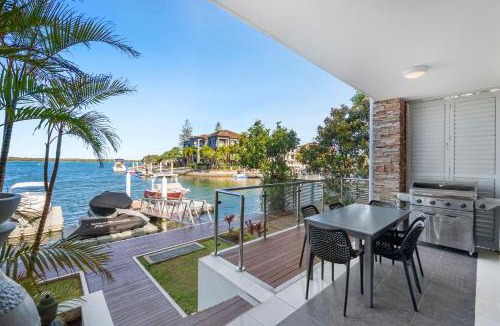 Runaway Bay Apartment | Waterfront Oasis in Runaway Bay - CoastHM