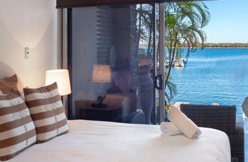 Runaway Bay Apartment | Waterfront Oasis in Runaway Bay - CoastHM