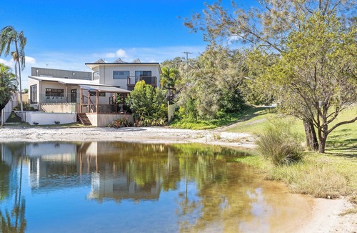 Burleigh Waters Apartment | Welcome to your lakeside oasis in beautiful Burleigh Waters!