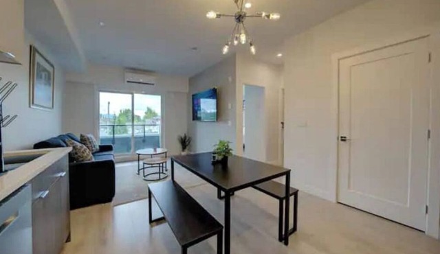 Central Condo with AC and Private Balcony