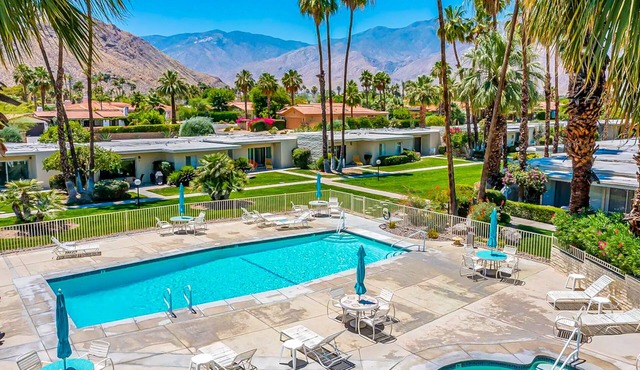 Color-filled charmer with pool & tennis access, patios, and AC
