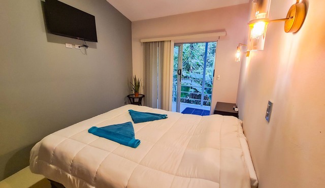 Cozy and Modern Room Perfect for traveling couples and lovers of the Caribbean