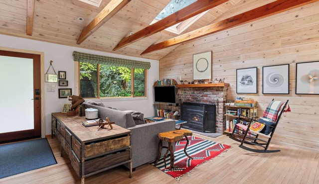 Cozy Riverfront Cabin with Dock, Fire Pit & Dogs OK