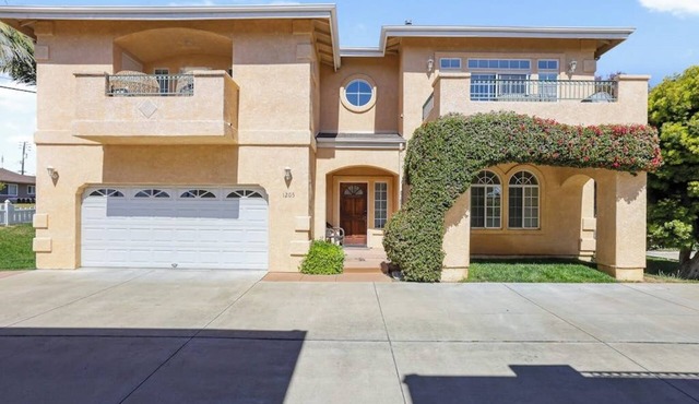Dog-friendly home near beach with fireplace, grill, yard, & W/D