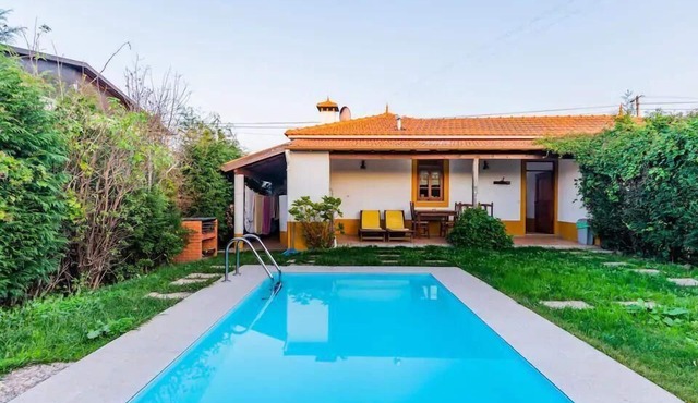 Holiday home with garden, grill, and terrace