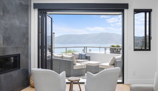 Hummingbird House — Private Rooftop Terrace, Panoramic Ocean & Pier Views, 2BR/2BA Luxury Home · Steps to Avila Beach · Fireplace · Gourmet Kitchen · Beach Gear & Bikes Included · Sleeps 5 · Managed by Solmaré Stays