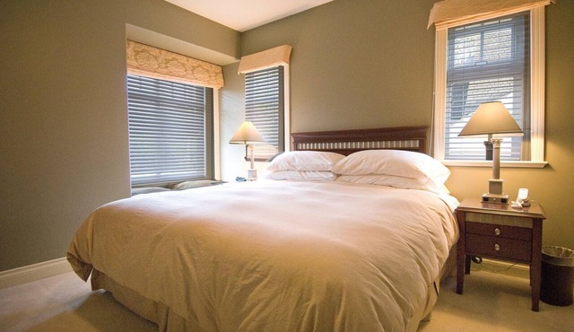 King bed, ensuite bathroom with shower