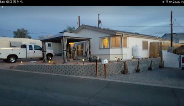 Large home, hilltop community on the Parker strip