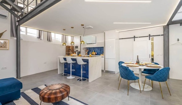 Loft with Historic Charm & Terrace by HostWise