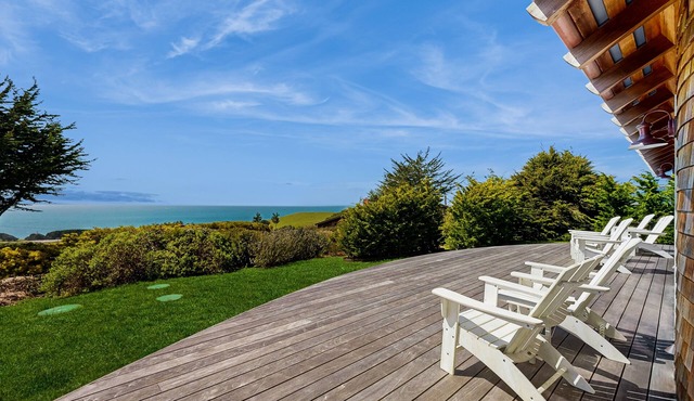 Luxurious, new coastal home w/modern kitchen, sweeping ocean and pastoral views