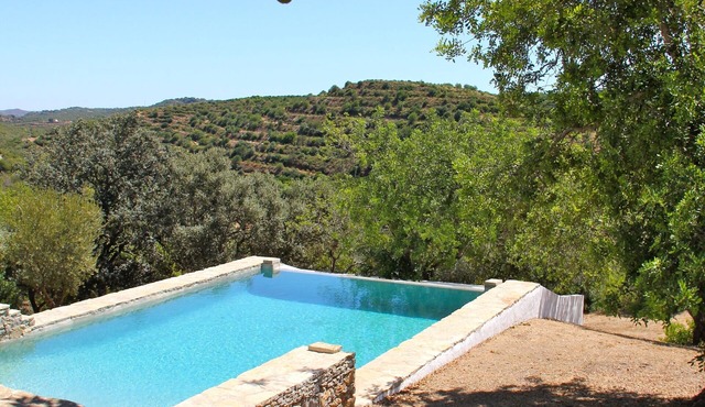 Luxurious Rural Farmhouse with an Infinity Pool , stunning views and location