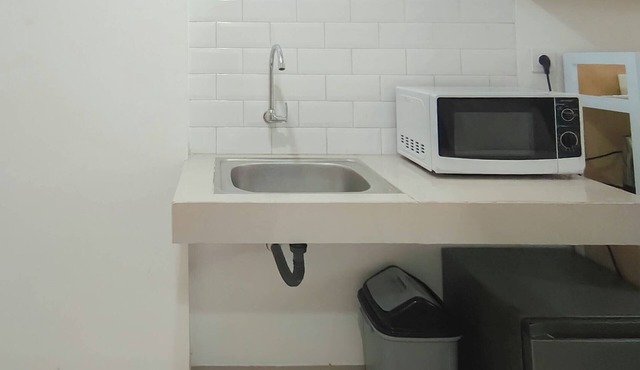 Neat And Warm Studio Room At Apartment Bandaraya - Tallasa City Makassar