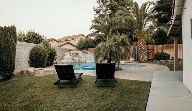Spacious 4BDRM with a Stunning Pool+Game Room and Firepit