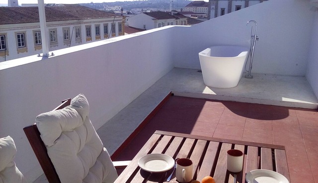Studio on the central square with a terrace with a hot tub and excellent views.