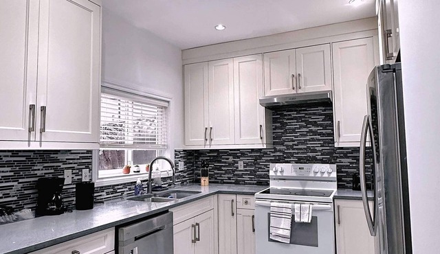 The warm and lovely coach home with 3 bedrooms
