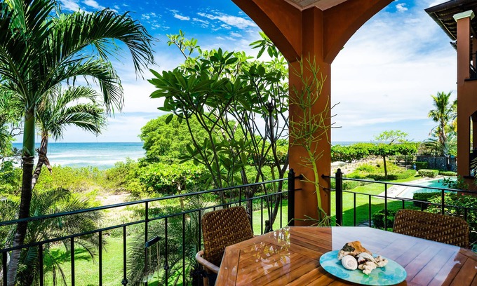 Playa Langosta Condo | Spacious beachfront 2-BR condo with Pool and a stunning sunset view