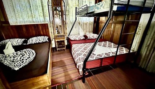 Single Bed in Dormitory Room