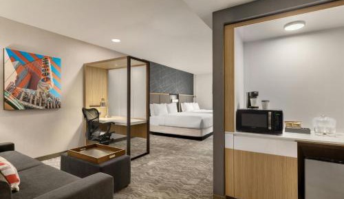 Studio Queen Suite with Two Queen Beds and Sofa Bed