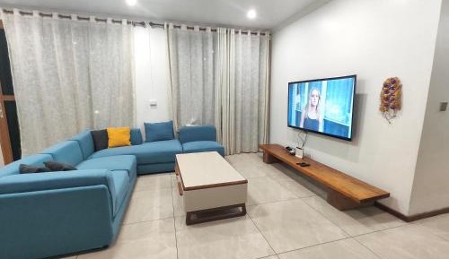 Three-Bedroom Premium Apartment with Balcony