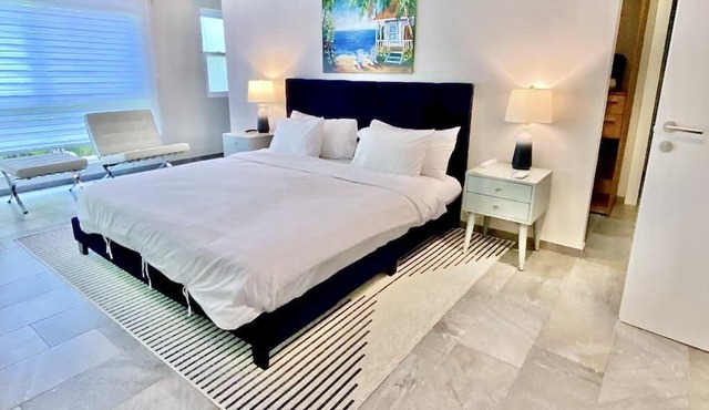 Awesome Walk to the Beach Luxury Jungle Condo in Gated Development with Pools