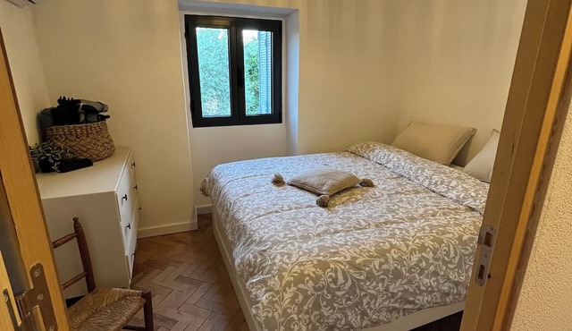 A cozy and comfortable house with a large garden in a beautiful setting!